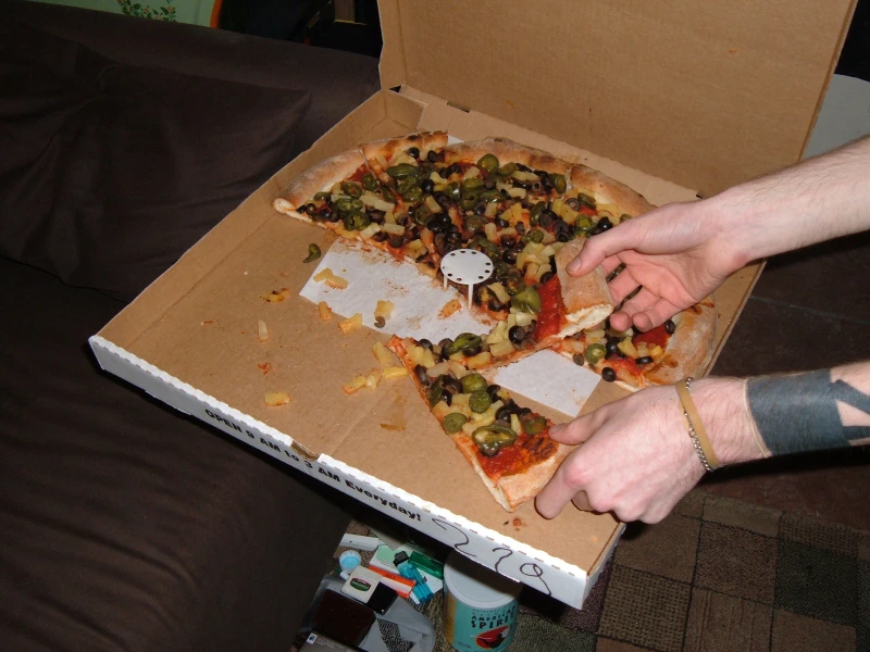 A pizza with lots of shit on it.