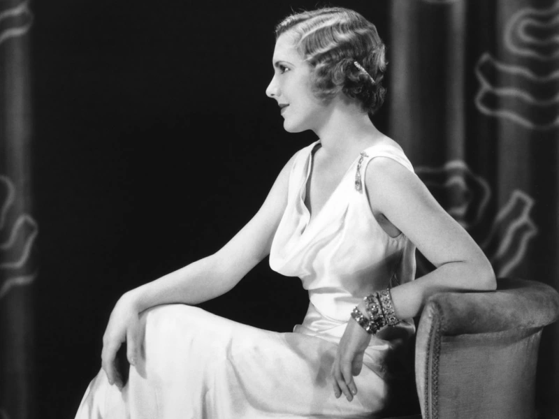 Jean Aurthur sits in judgment.