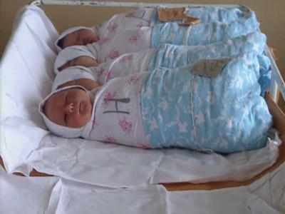 Several tightly bound Russian babies.