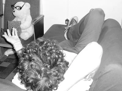 Josh describes his dreams to a stuffed bear.