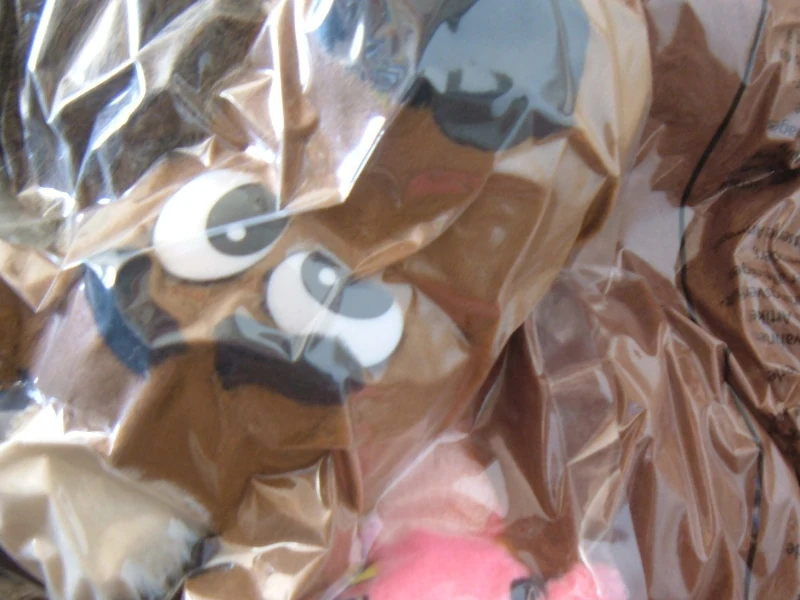 Vacuum-sealed stuffed animals.