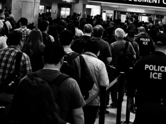 A long line of travelers not traveling.