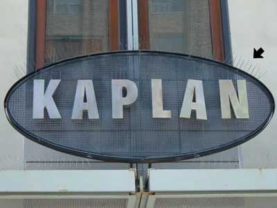 Kaplan covers their sign in spikes.