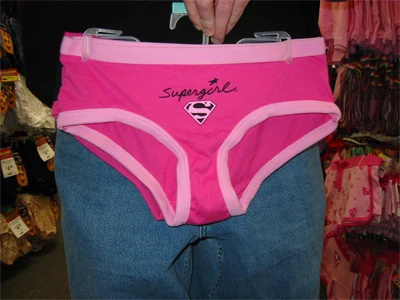 Kevin tries on a pair of Supergirl-branded underwear.